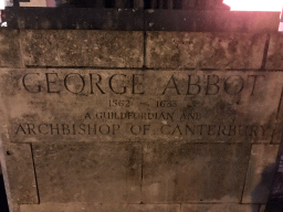 Inscription at the Statue of George Abbot, at the crossing of North Street and High Street, by night