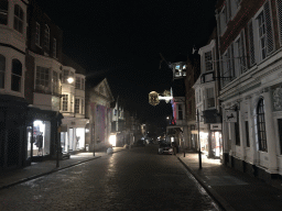 High Street with the front of the Tunsgate Arch and the Guildhall, by night