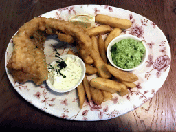 Beer Battered Fish & Chips with Mushed Peas at the Prince of Wales restaurant at Terminal 4 of London Heathrow Airport