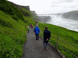 Miaomiao`s father on the path from the lower viewpoint to the closeby viewpoint of the Gullfoss waterfall