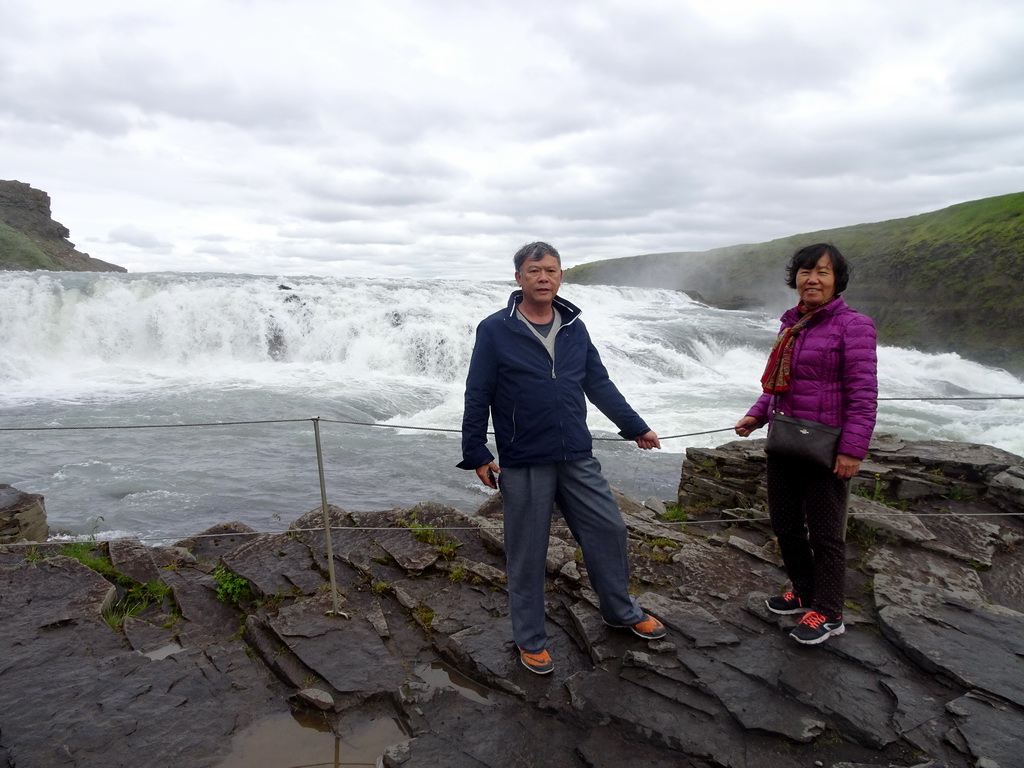 Miaomiao`s parents at the closeby viewpoint of the Gullfoss waterfall, with a view on the upper part