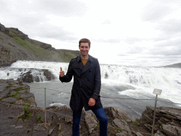 Tim at the closeby viewpoint of the Gullfoss waterfall, with a view on the upper part