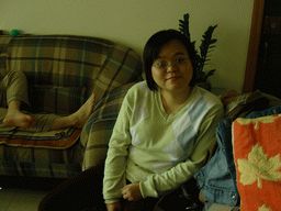 Miaomiao`s sister in the living room of her parents` place