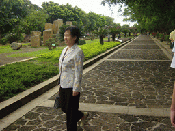 Miaomiao`s mother at the entrance path to the Hainan Volcano Park