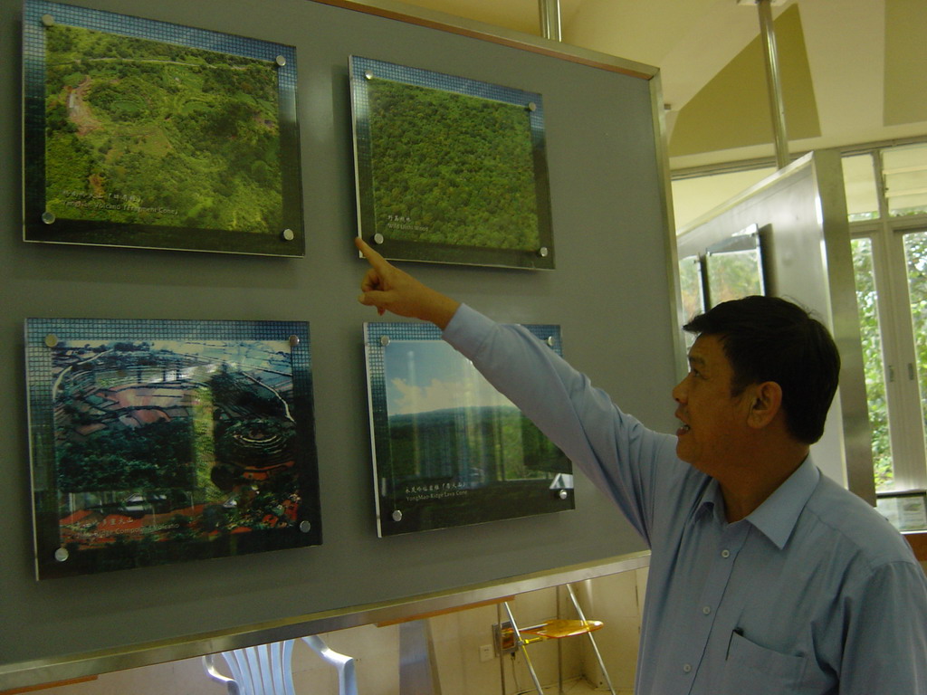 Miaomiao`s father at the museum of the Hainan Volcano Park