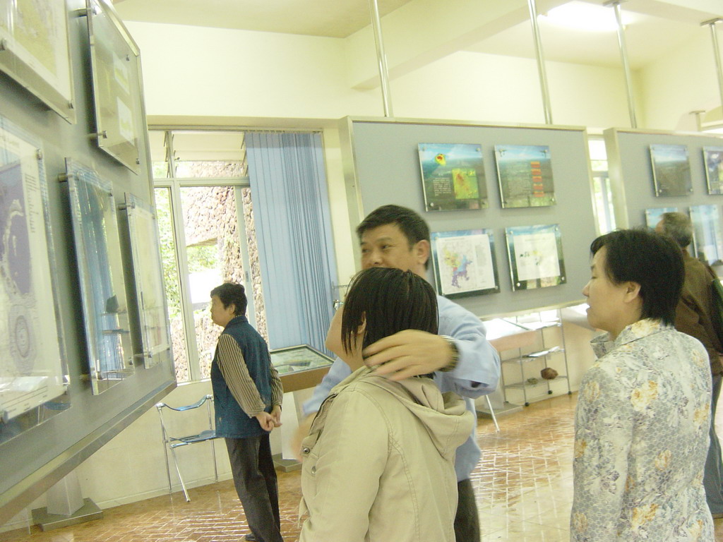 Miaomiaos parents and sister at the museum of the Hainan Volcano Park