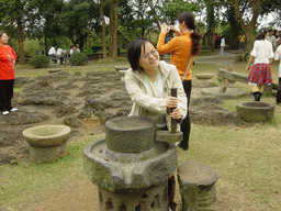 Miaomiao`s sister at the old village at the Hainan Volcano Park