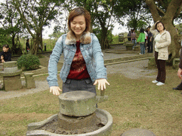 Miaomiao and her sister at the old village at the Hainan Volcano Park