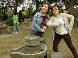 Miaomiao and her sister at the old village at the Hainan Volcano Park