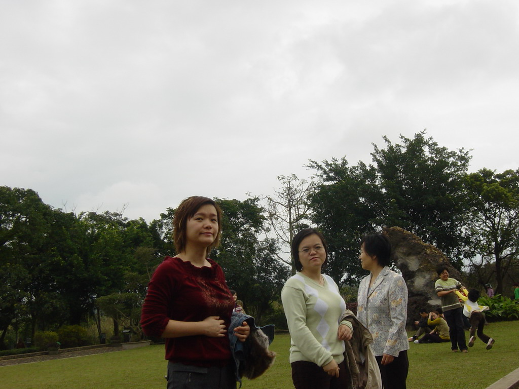 Miaomiao with her sister and mother at the Hainan Volcano Park