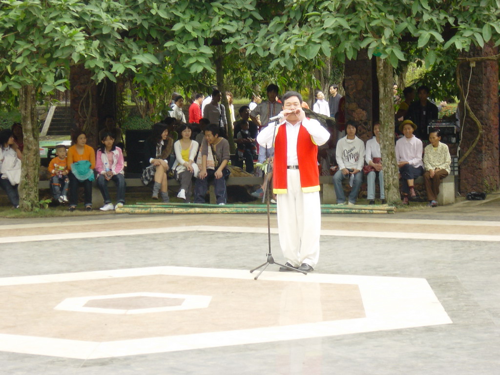 Musician on the stage at the Hainan Volcano Park