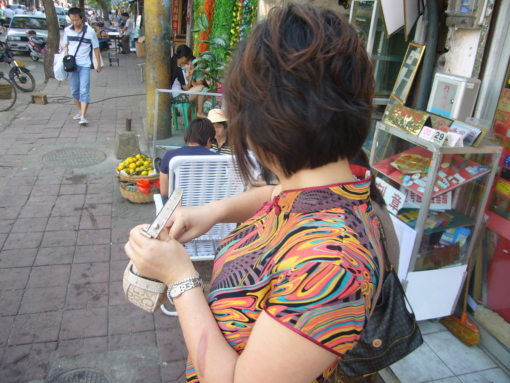 Miaomiao at a shopping street in the city center, during the photoshoot