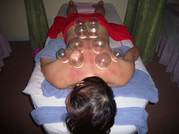 Miaomiao having a Chinese cupping massage at a massage salon in the city center