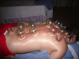 Miaomiao having a Chinese cupping massage at a massage salon in the city center