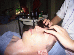 Tim and Miaomiao having a facial massage at a massage salon in the city center