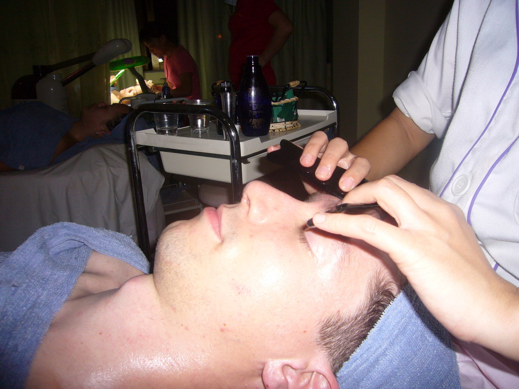 Tim and Miaomiao having a facial massage at a massage salon in the city center