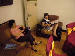 Miaomiao and her mother at a restaurant in the city center