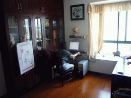 Miaomiao in the computer room in the apartment of Miaomiao`s parents