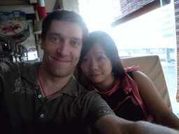 Tim and Miaomiao in a restaurant in the center of the city