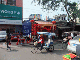 Rickshaws and shops in the city center