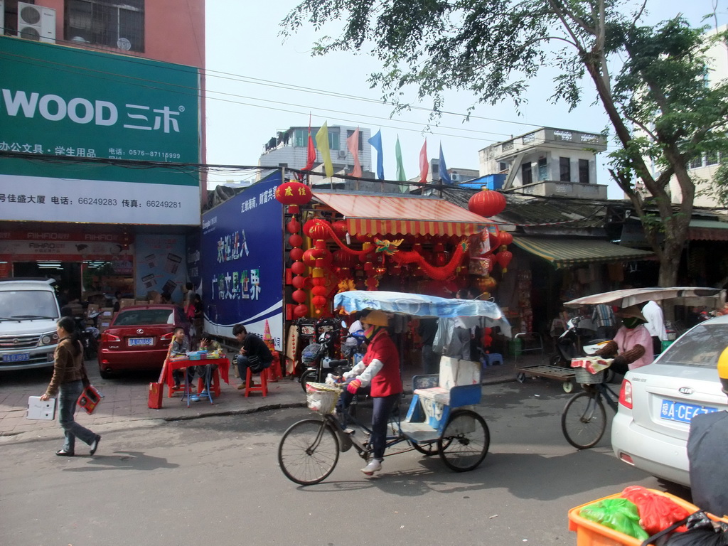 Rickshaws and shops in the city center