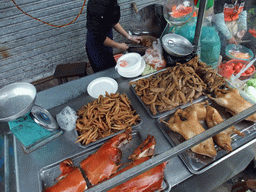 Market stall with meat in the city center