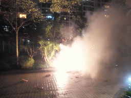 Fireworks at the square in front of Miaomiao`s parents` home, just before the Chinese New Year, by night