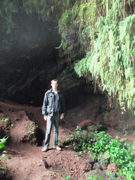 Tim in a cave at the Mt. Fengluling volcano crater at the Hainan Volcano Park