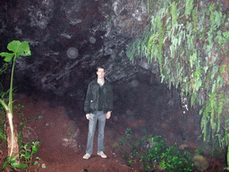 Tim in a cave at the Mt. Fengluling volcano crater at the Hainan Volcano Park