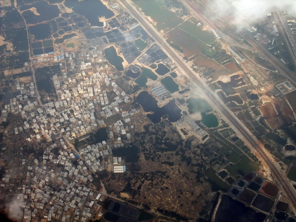 Houses, farmland and lakes to the west of Haikou, viewed from the airplane from Zhengzhou