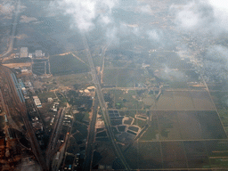 Railroad, roads and farmland to the west of Haikou, viewed from the airplane from Zhengzhou