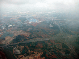 Highway crossing and surroundings to the southwest of Haikou, viewed from the airplane from Zhengzhou