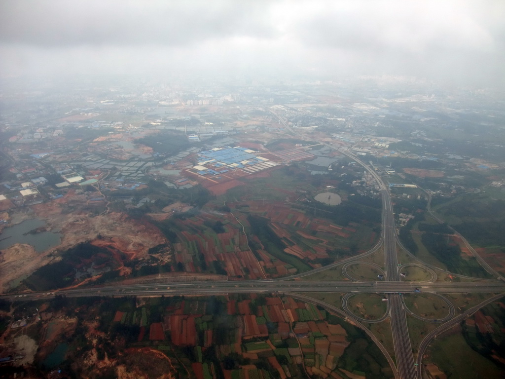 Highway crossing and surroundings to the southwest of Haikou, viewed from the airplane from Zhengzhou