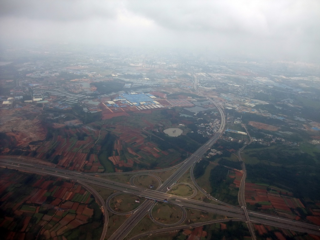 Highway crossing and surroundings to the southwest of Haikou, viewed from the airplane from Zhengzhou