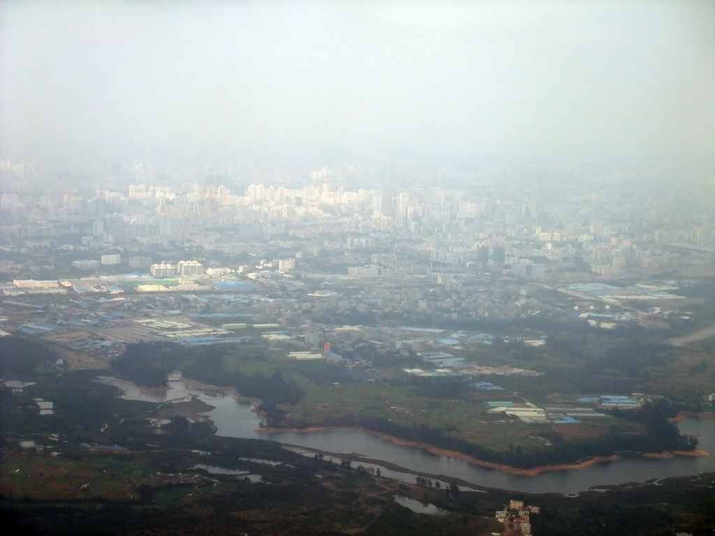 Skyline of Haikou and a lake to the south of the city, viewed from the airplane from Zhengzhou