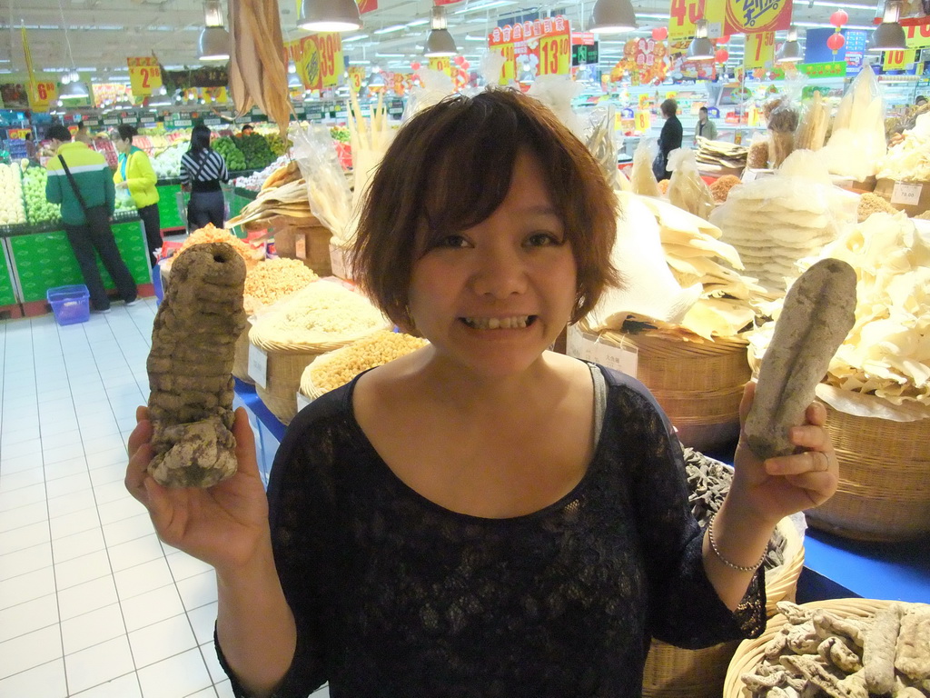 Miaomiao with dried food at the Carrefour supermarket