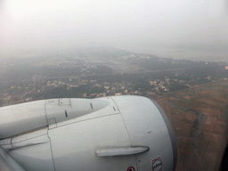 Area west of the Haikou Meilan International Airport with the railway bridge over the Nandu River, viewed from the airplane from Xiamen