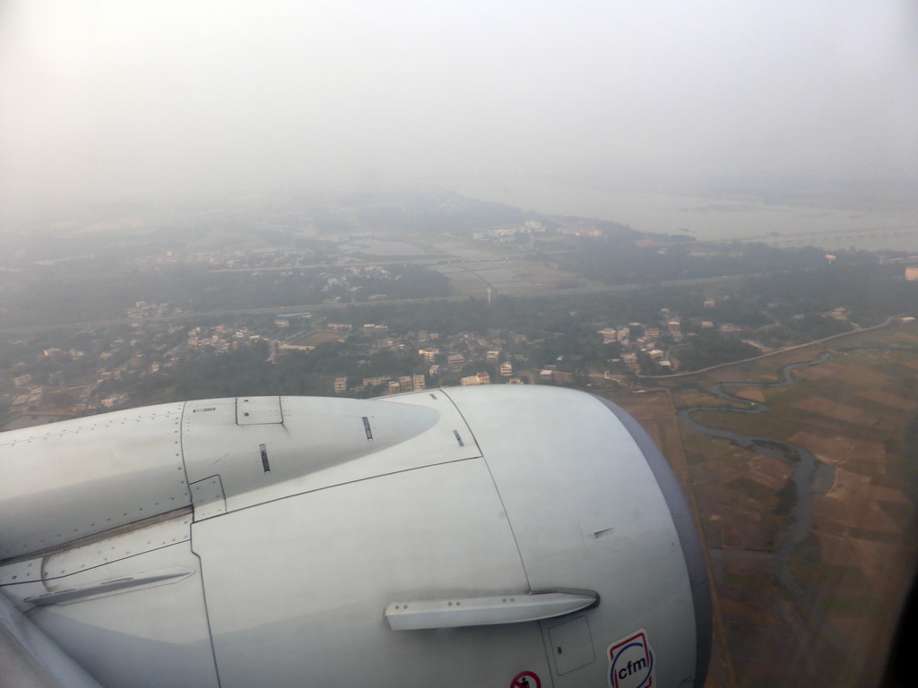 Area west of the Haikou Meilan International Airport with the railway bridge over the Nandu River, viewed from the airplane from Xiamen