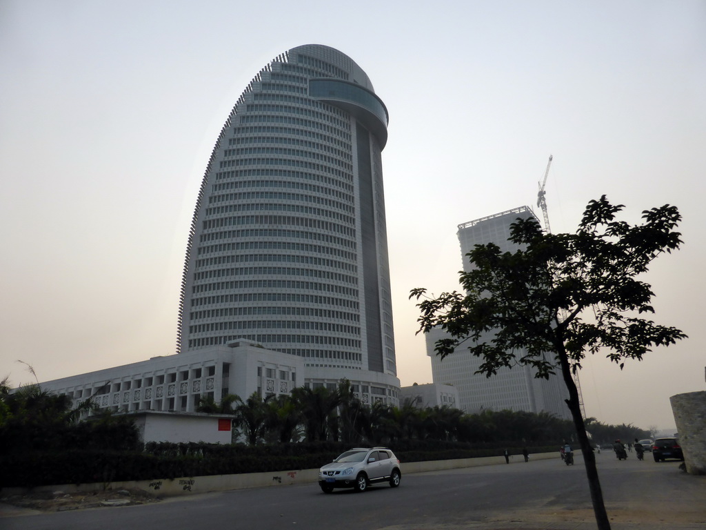 The Hainan Government Office Building and the Hainan Tower at Dayingshan West 4th Road, viewed from the car
