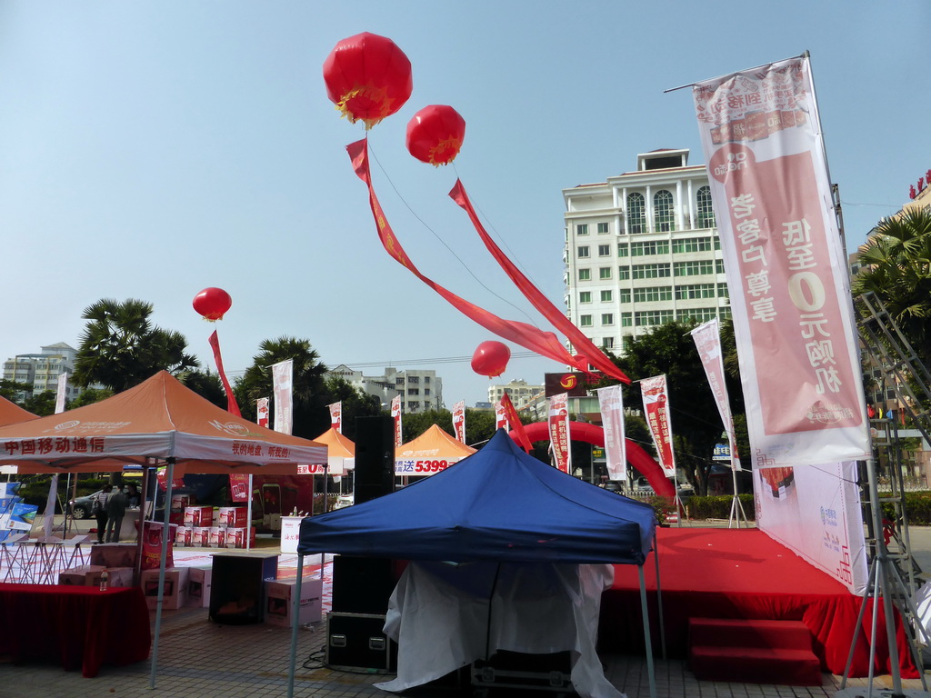 Square with stalls and paper lanterns in the city center