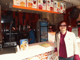 Miaomiao in front of the 52Tea shop at Nanbao Road
