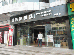 Miaomiao in front of the Sweethoney Dessert restaurant at Nanbao Road