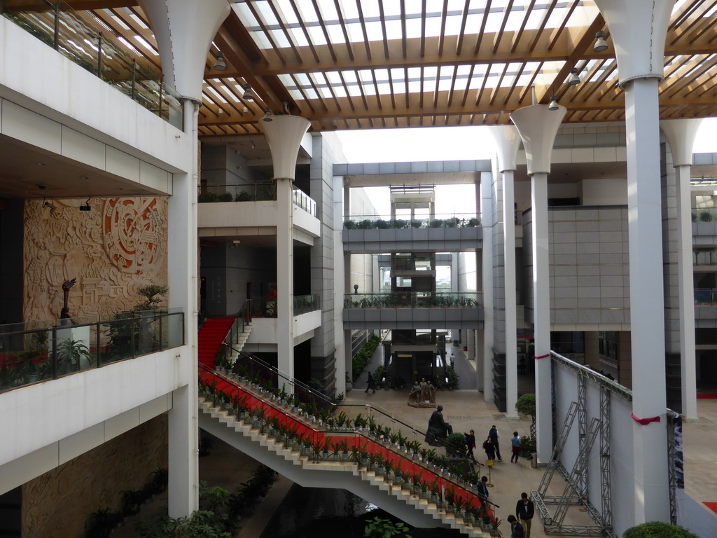 Central staircase and central relief at the Hainan Provincial Museum, viewed from the middle floor
