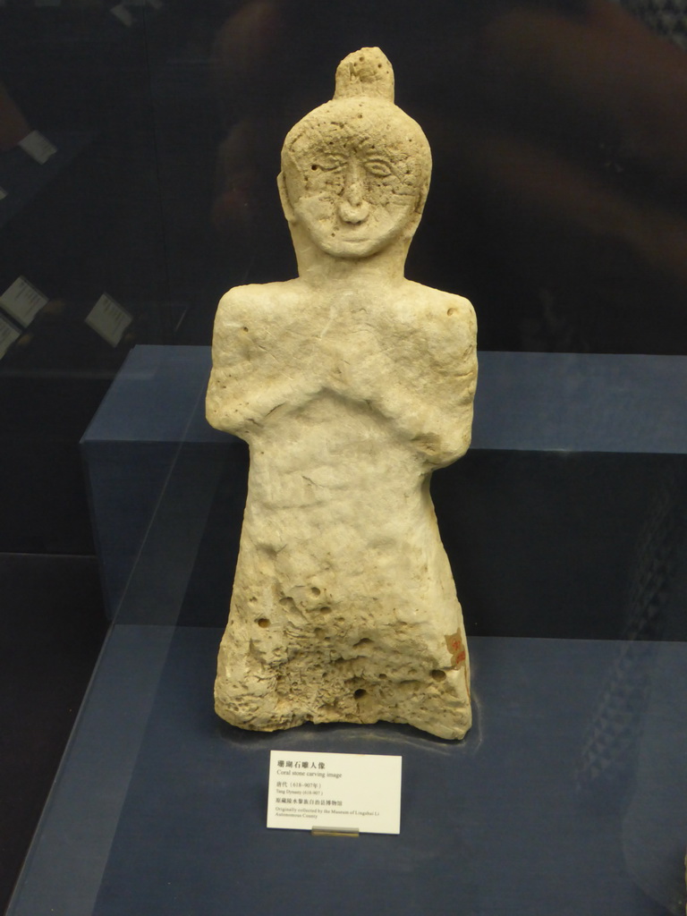 Statue made from coral stone at the `Exhibition of History of Hainan II: Continent Reclamation` at the middle floor of the Hainan Provincial Museum