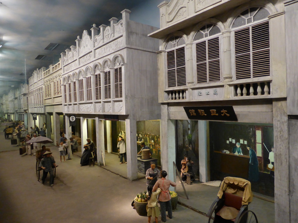 Wax statues in an old street in Haikou, at the `Exhibition of History of Hainan V: Modern Qiongya` at the middle floor of the Hainan Provincial Museum