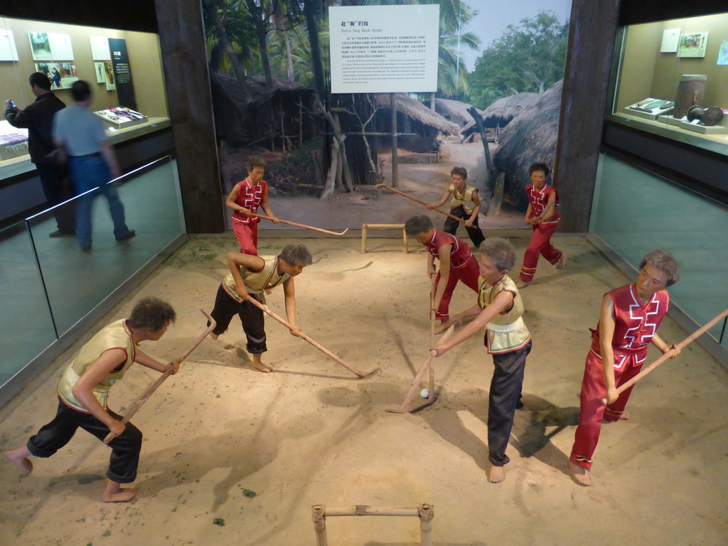 Wax statues of people from the Li tribe playing the ball game `Drive Dog Back Home`, at the `Exhibition of Minority Nationalities in Hainan IV: Material Life` at the top floor of the Hainan Provincial Museum