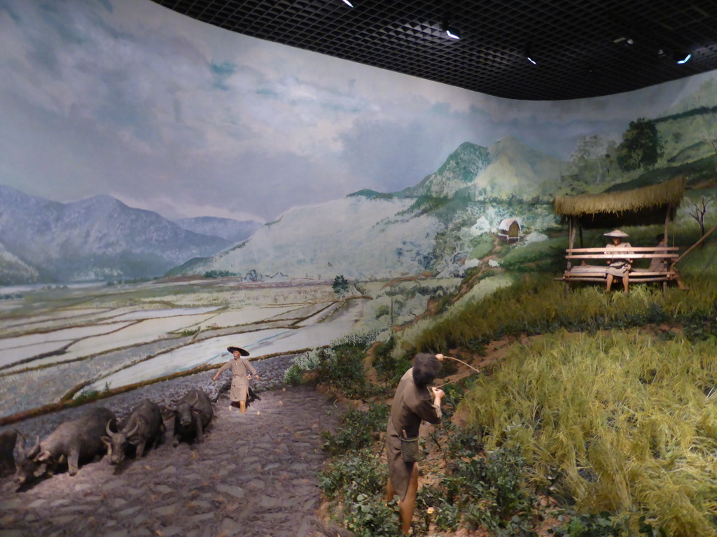 Wax statues of people from the Li tribe working in the field, at the `Exhibition of Minority Nationalities in Hainan II: Means of Livelihood` at the top floor of the Hainan Provincial Museum