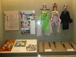 Clothing and hand puppets for Lin`gao man puppet drama, at the `Exhibition of Hainan Intangible Cultural Heritage II: Traditional Performing Arts` at the top floor of the Hainan Provincial Museum