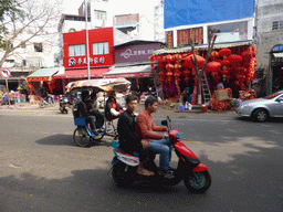 Rickshaw and scooter at Bo`Ai South Road