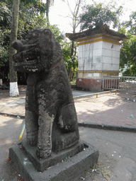 Statue in front of the north entrance to Haikou People`s Park at Donghu Road